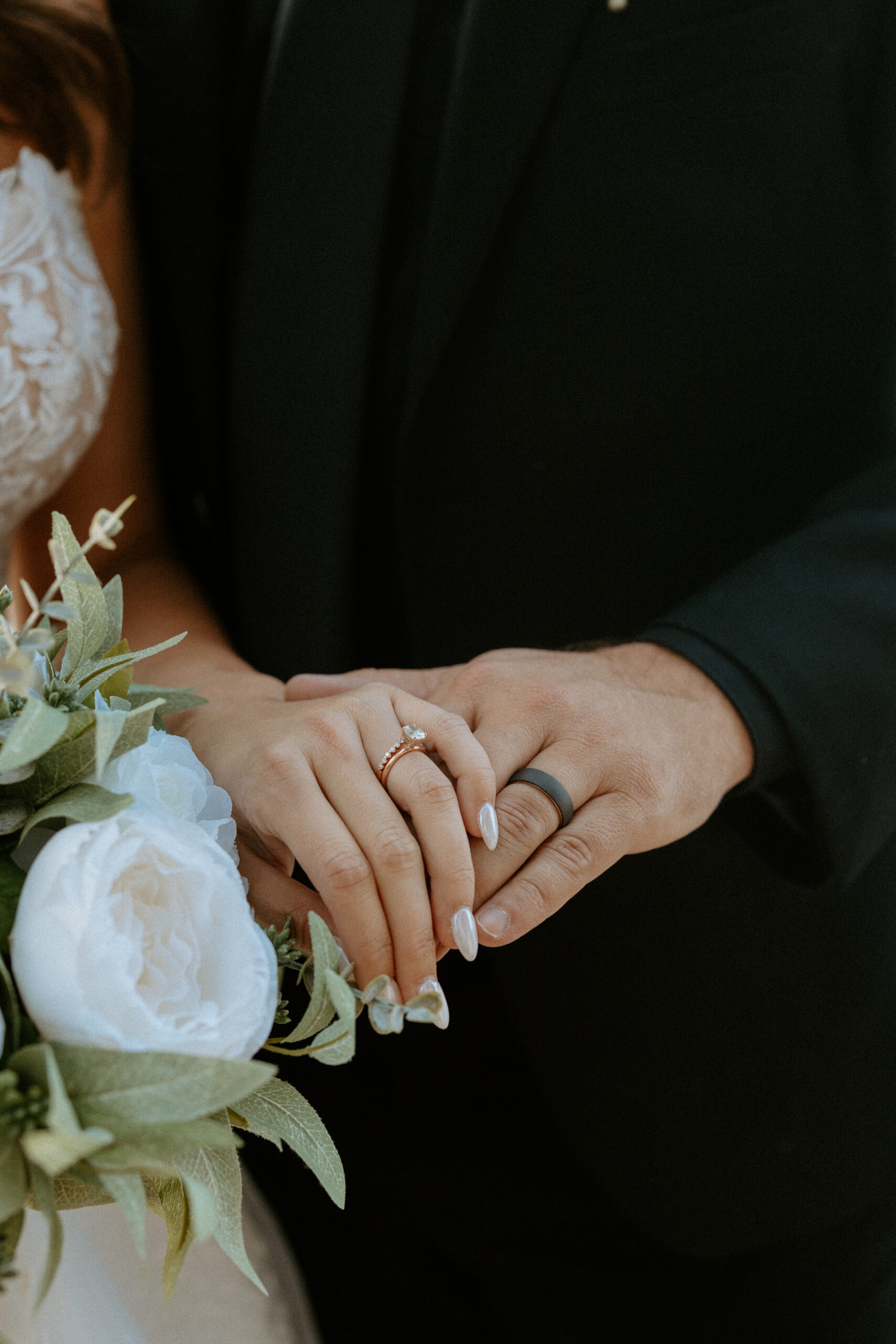 Valhalla Tahoe Destination Wedding. wedding couple holding out hands with rings